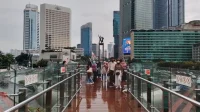 gedung-tertinggi-jakarta-bundaran-hi kawasan Bundaran HI dengan gedung tertinggi di Jakarta, menara Thamrin Nine, di latar belakang