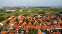 Harga tanah perumahan di tepi lahan sawah